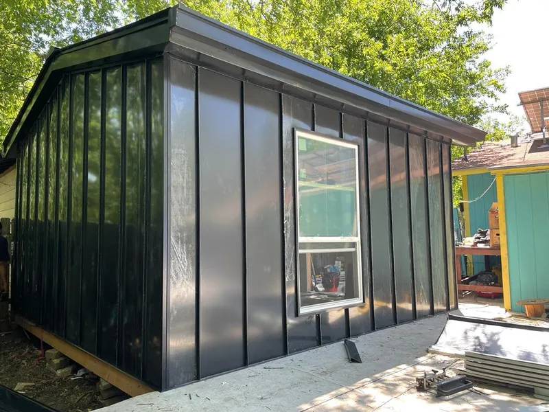 Black standing seam metal wall panels for Metal Roof Installation in Austell